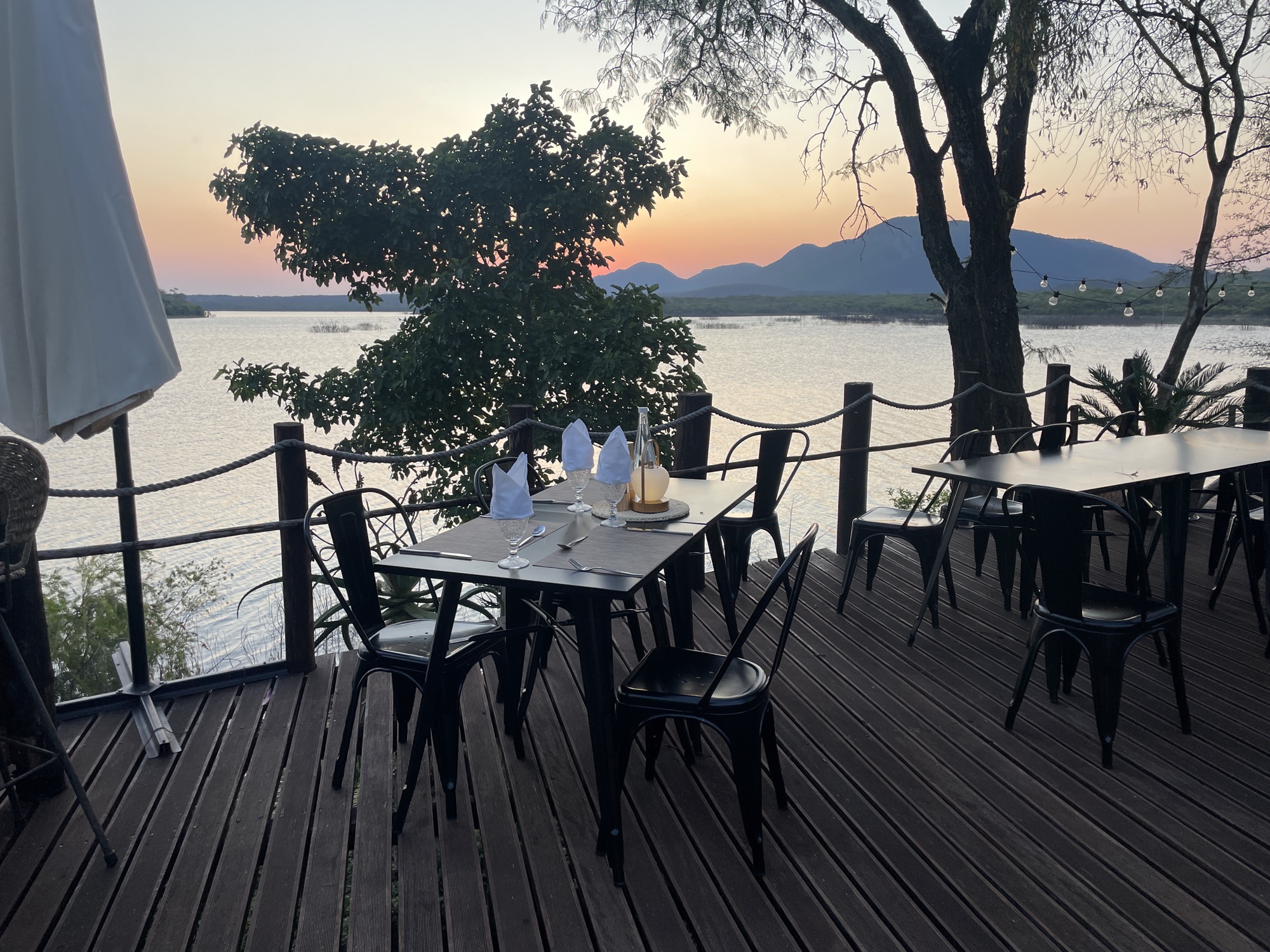 Deck dining at Romelda Lakeside Retreat